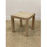 A contemporary lamp table, the panelled top on square section supports. H