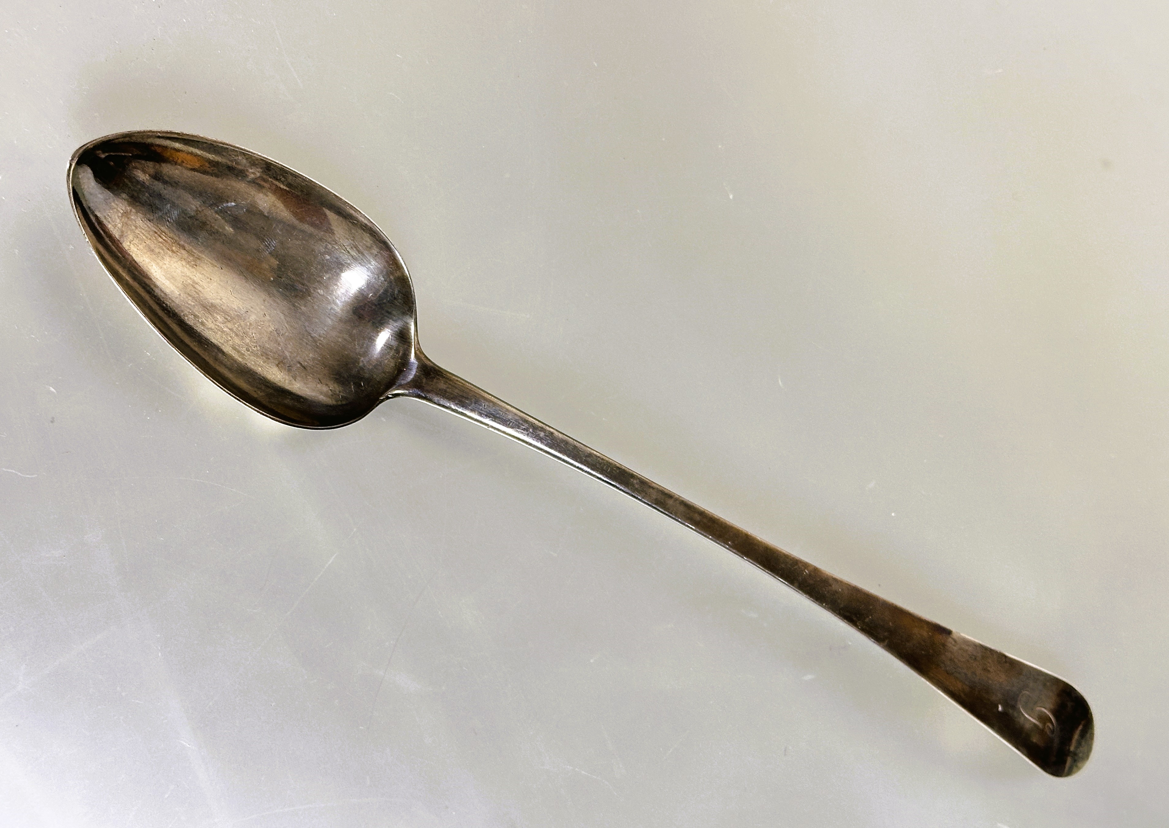 A George III Newcastle silver old English pattern basting spoon with engraved initial G L x 31.5cm