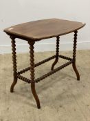 A Victorian mahogany occasional table, the shaped top raised on bobbin turned and splayed supports