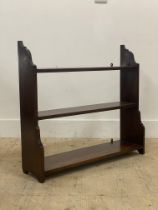 A late 19th century mahogany three tier waterfall wall shelf. H70cm, W77cm, D22cm.