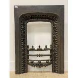 A Victorian cast iron fire insert. H95cm, W69cm.