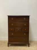 A vintage stag mahogany chest chest of four long and three short drawers raised on bracket supports.