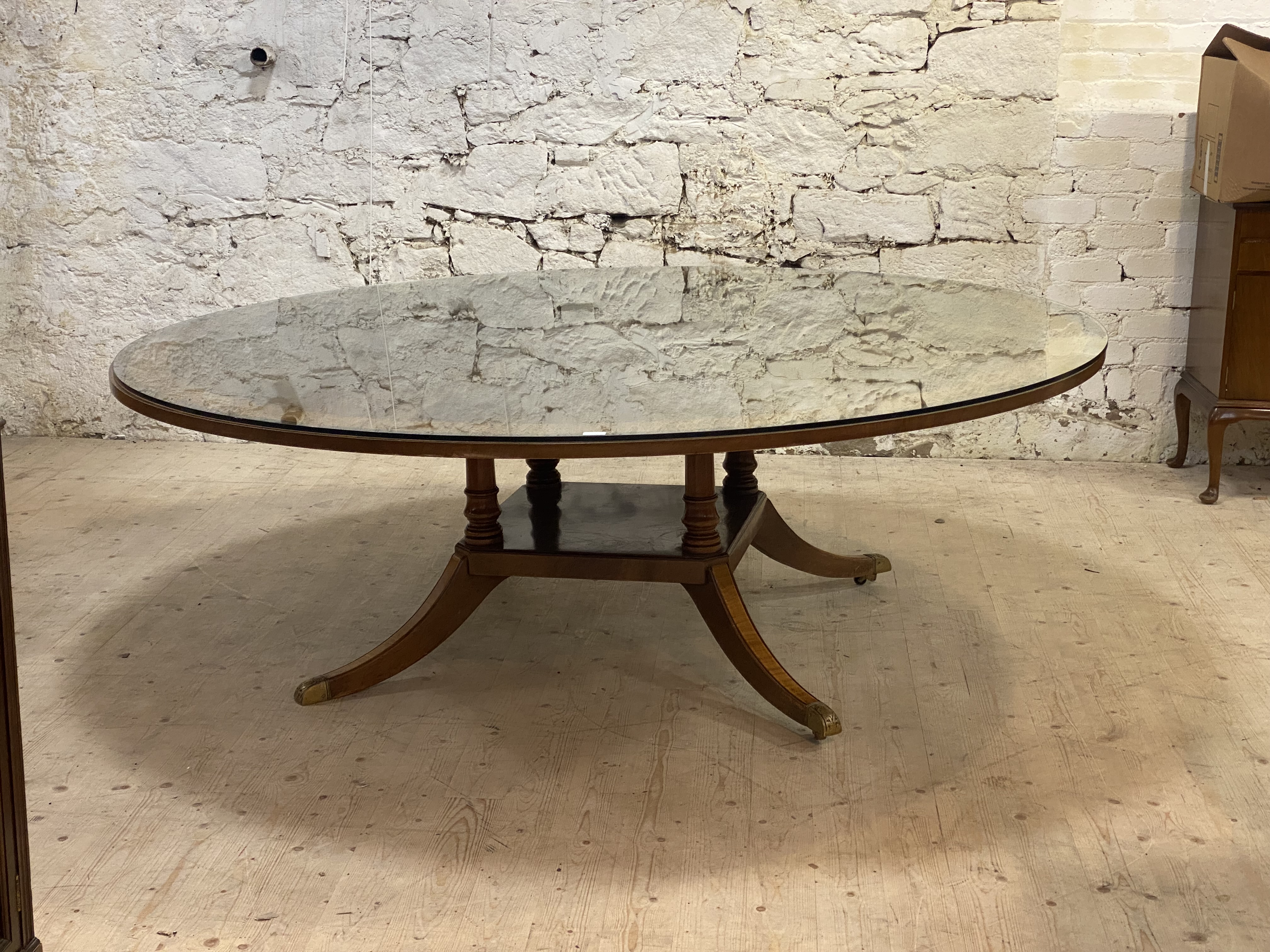 Restall Brown & Clennell, a large Regency style mahogany dining table, the circular top with cross - Image 2 of 4