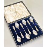 A Edwardian set of six Sheffield silver tea spoons with original fitted case retailed by Ralph C