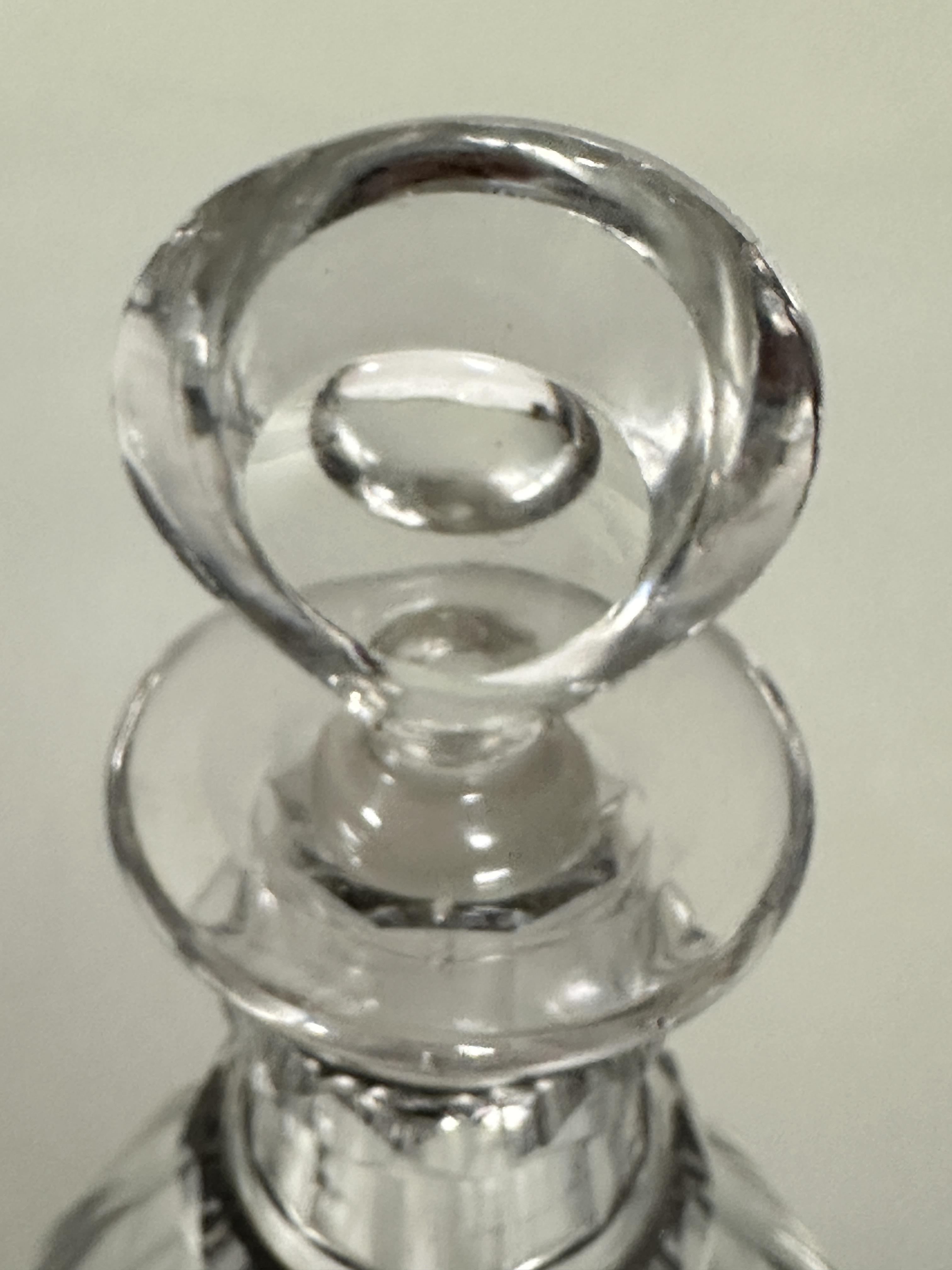 A pair of Georgian mallet shaped fluted crystal decanters with original stoppers chips to edge of - Image 2 of 3