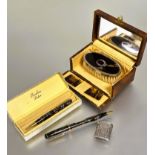 A early marbled plastic Burnham fountain pen and propelling pencil set in original fitted box L x
