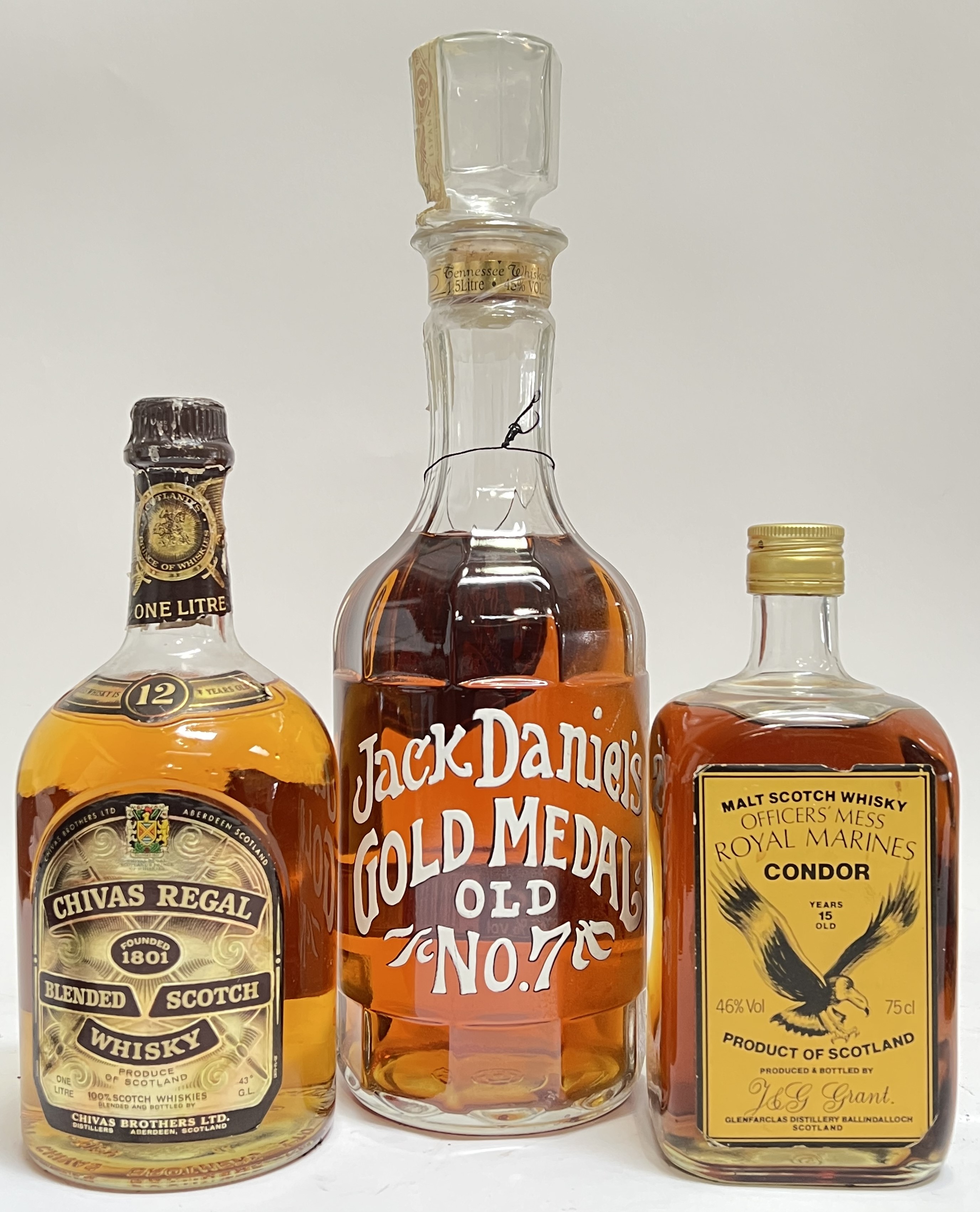 A 1.5 litre bottle of Jack Daniels Gold Medal Old no.7 whisky, together with a one litre bottle of