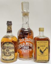 A 1.5 litre bottle of Jack Daniels Gold Medal Old no.7 whisky, together with a one litre bottle of