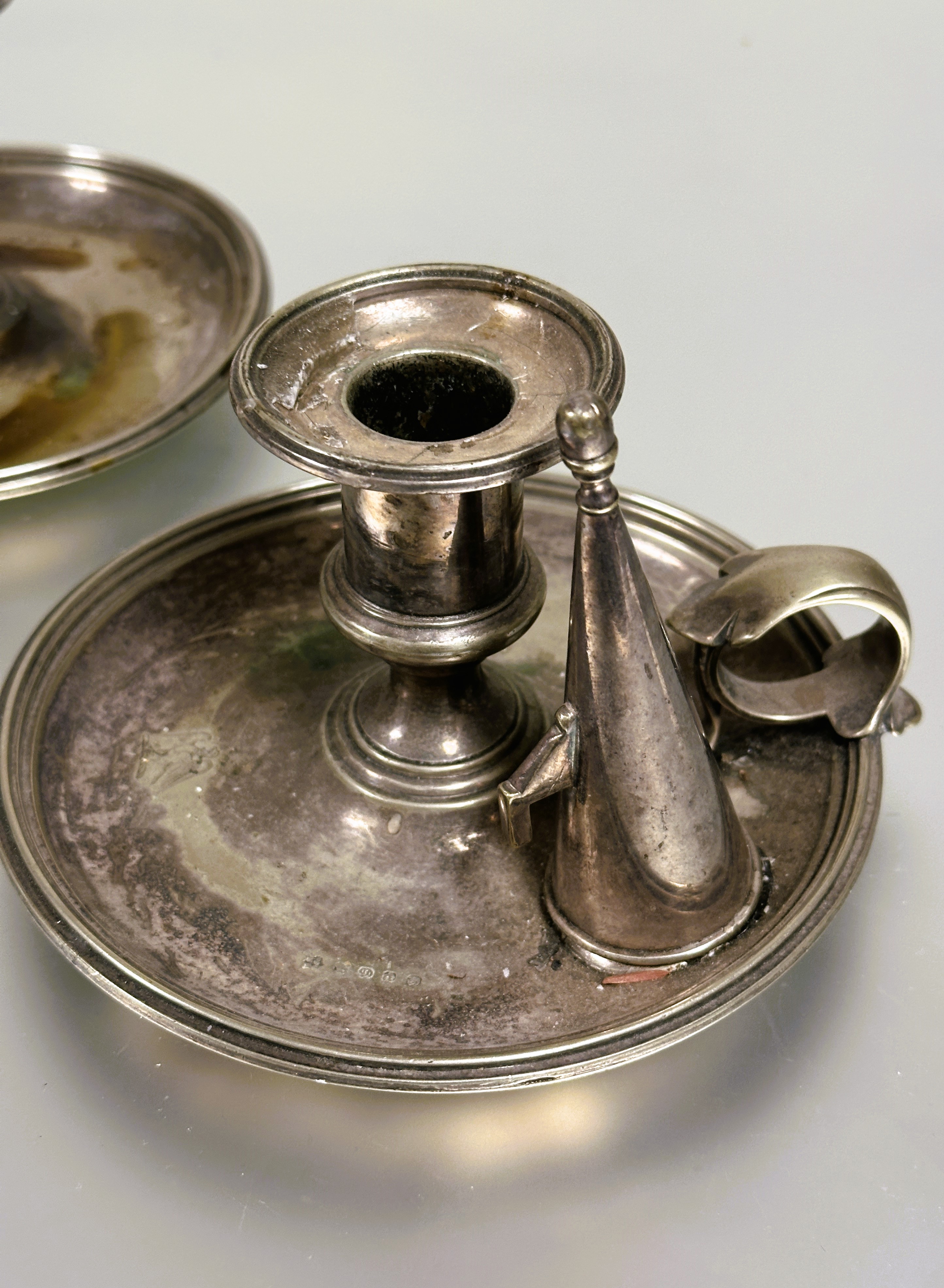 A pair of late Victorian Epns chamber candlestick holders with leaf scroll handles complete with - Image 2 of 2