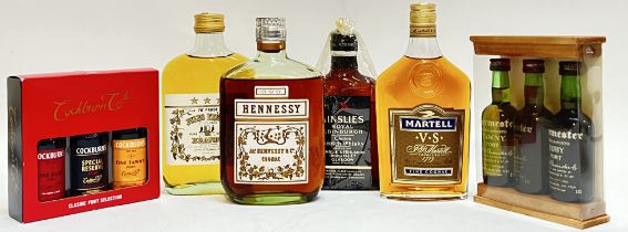 A mixed group of liquor comprising three miniature Cockburn Port bottles (5cl), a bottle of Jules