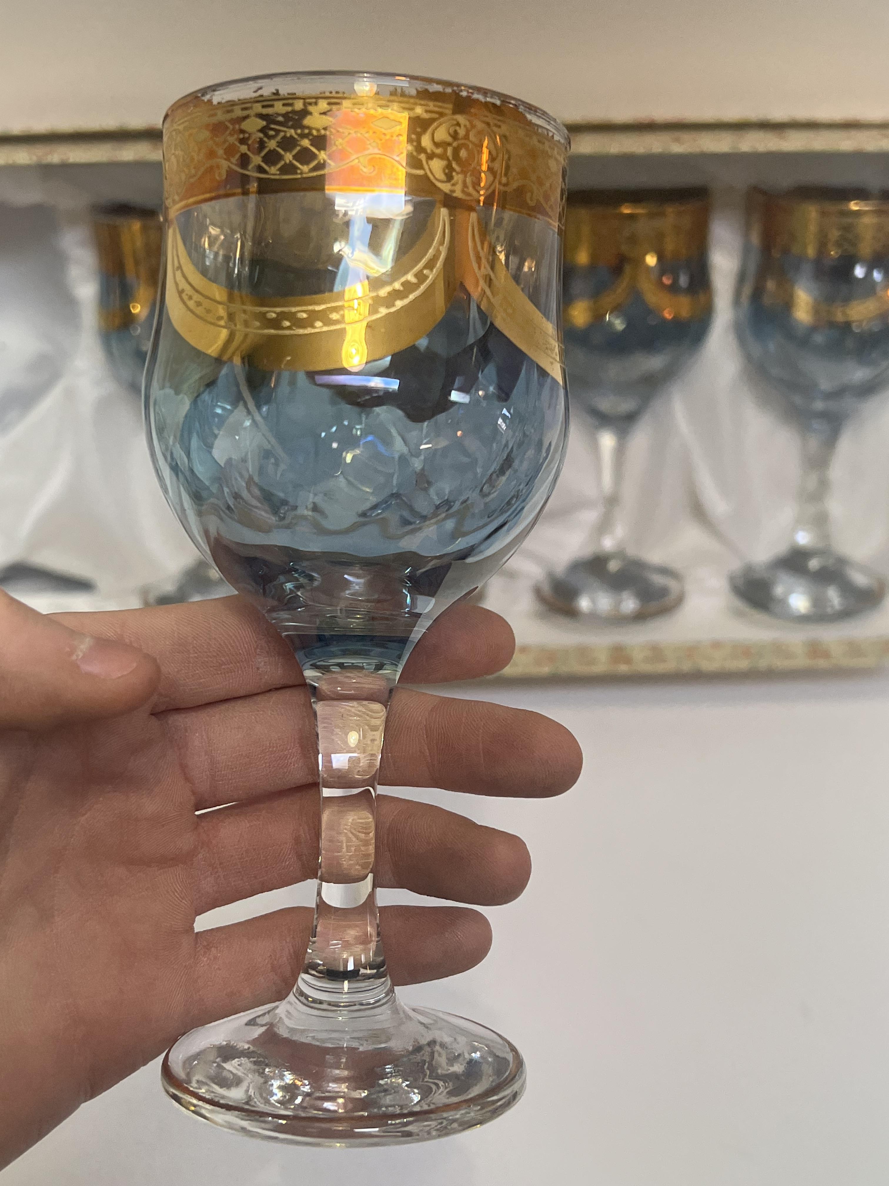 A boxed set of six blue and clear glass stemmed goblets/wine glasses, with gilt swag decoration ( - Image 2 of 2