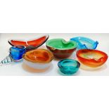 A group of seven brightly coloured Italian art glass bowls of various abstract forms (largest h-