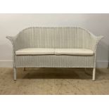 A Lloyd Loom basketwork to seat sofa, with squab cushions and cylindrical supports. H95cm, W152cm.