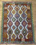 A flatweave chobi kilim rug of typical design. 174cmx  127cm.