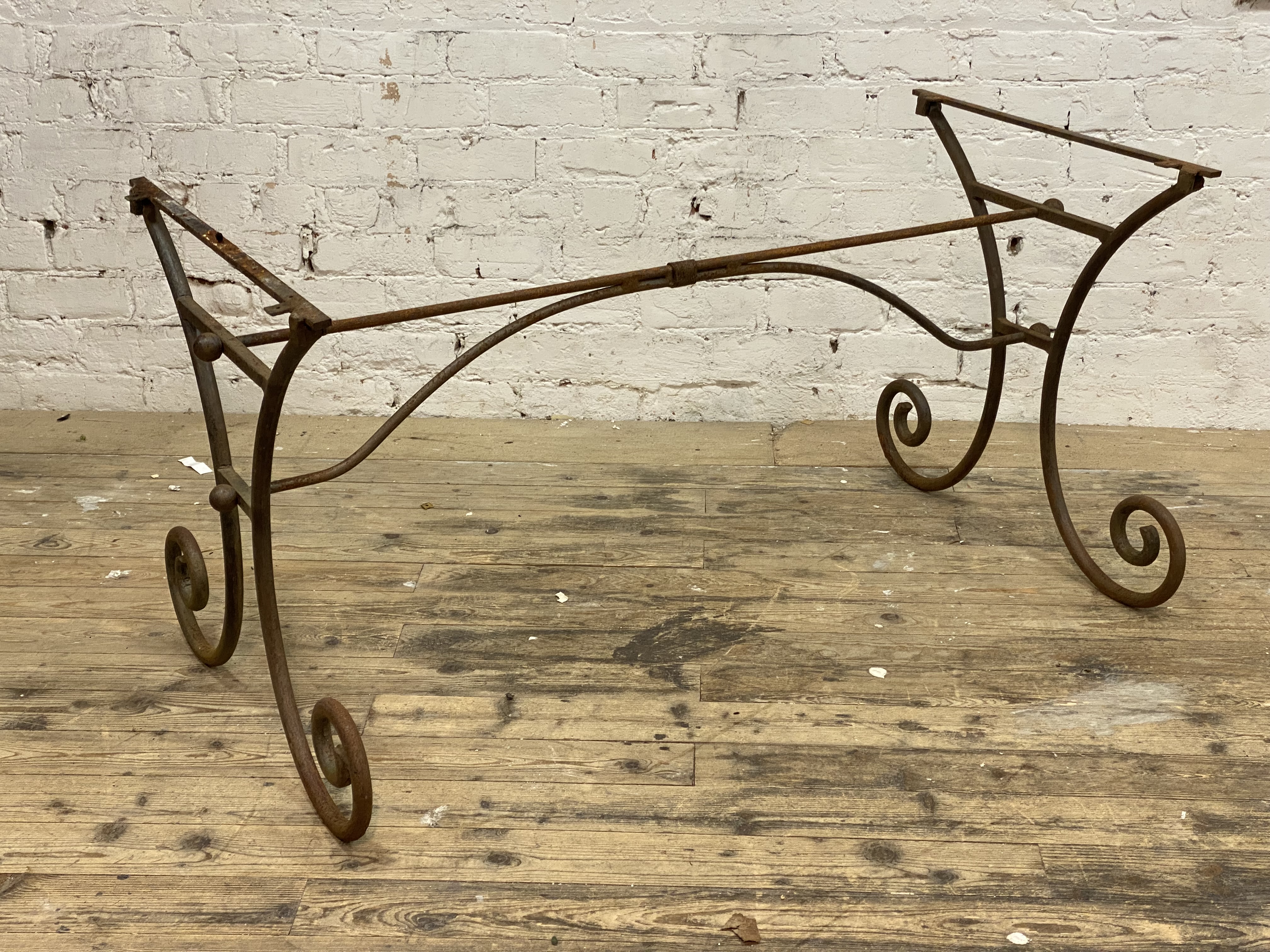 A 19th century French wrought iron patisserie table base of scrolling form, H73cm, D142cm, L72cm. - Image 2 of 2