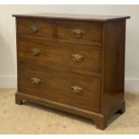 An Edwardian mahogany chest, fitted with two short and two long drawers, raised on bracket supports.