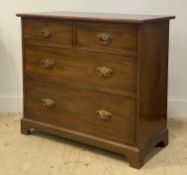 An Edwardian mahogany chest, fitted with two short and two long drawers, raised on bracket supports.