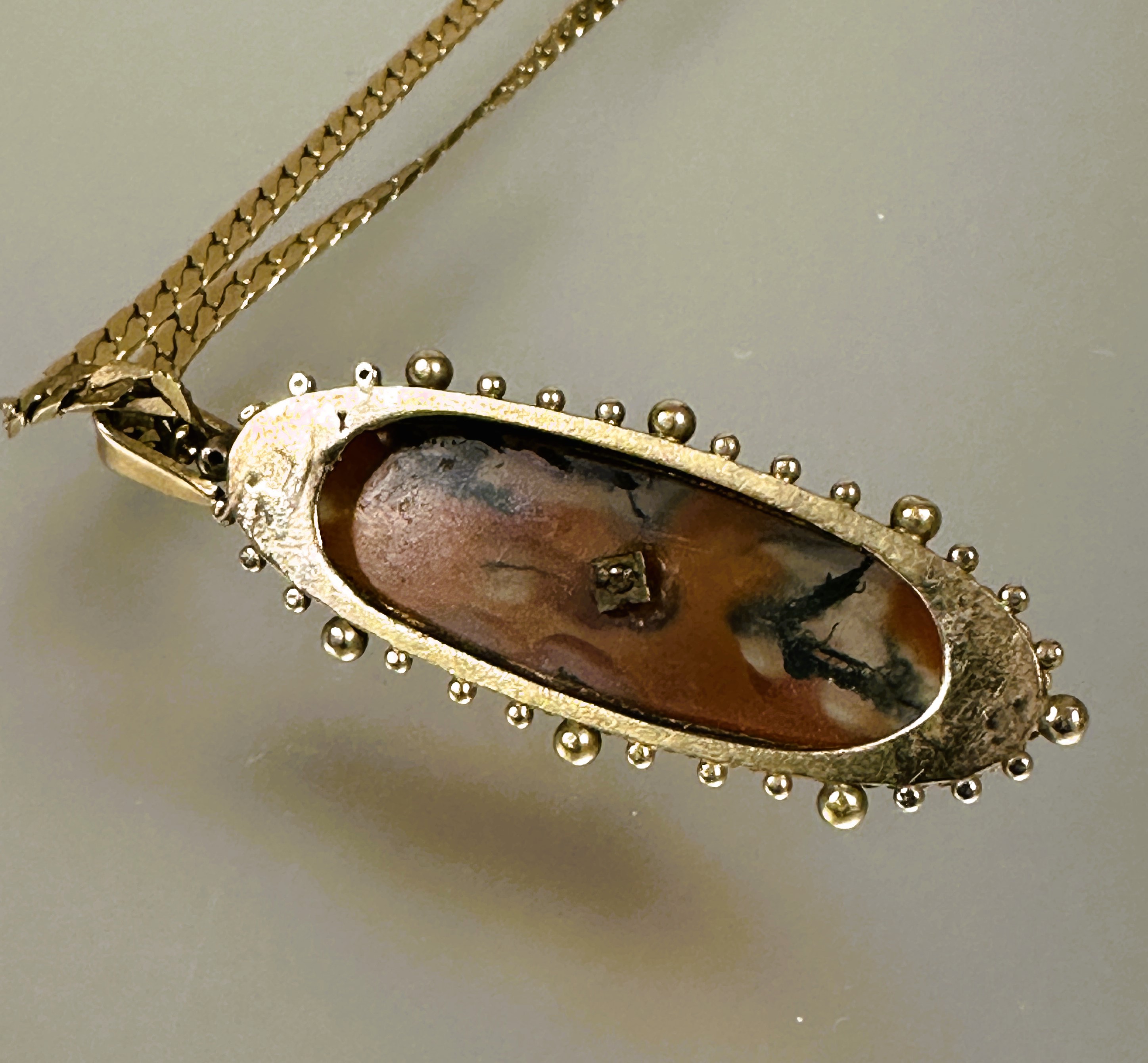 A Victorian yellow metal navette shaped pendant set moss age with star set center half seed pearl - Image 3 of 3