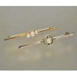 A 9ct gold bar brooch set central circular enclosed cultured pearl L x 6cm and a 9ct gold bar brooch
