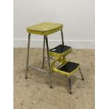 A mid century chrome and vinyl folding step stool. H61cm.