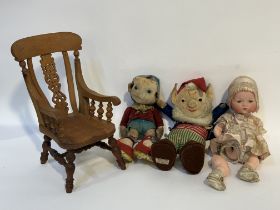 A collection of vintage dolls, an Edwardian bisque head doll with a pink and lace satin dress and