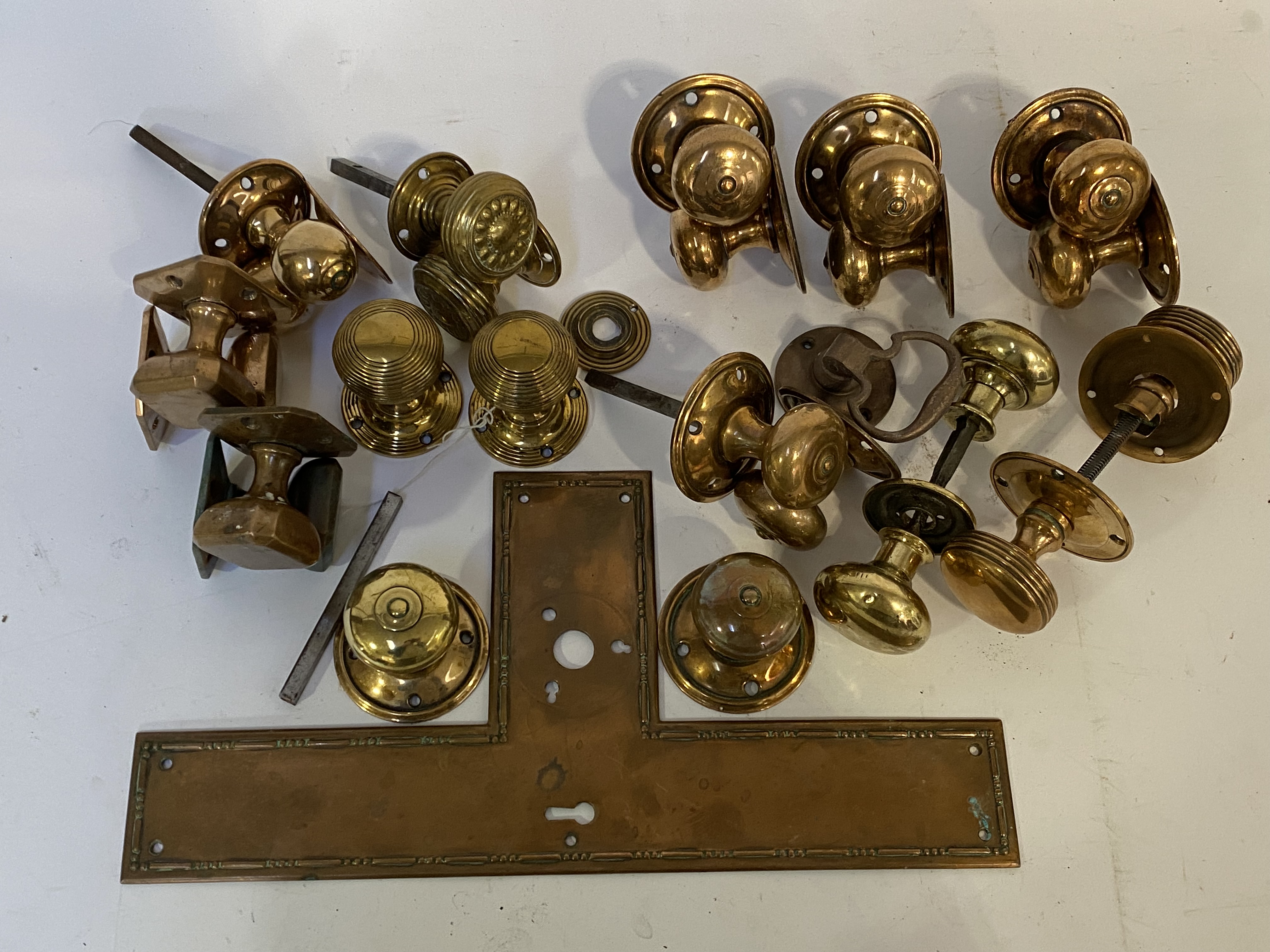 A quantity of mostly 19th century door furniture, to include a copper finger plate, a pair of - Image 3 of 3