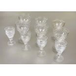 A part set of crystal slice cut tapered glasses to include a pair of red wine glasses, H x 11.5cm,