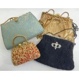 A collection of vintage/mid-century ladies' evening bags comprising an Art Deco style Viyella bag