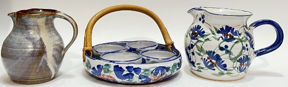 Crail Pottery, a group of studio ceramics comprising a jun glazed jug (marked verso), a Cornflower