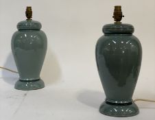 A pair of Vintage Denby blue glazed ceramic baluster table lamp bases. H40cm.