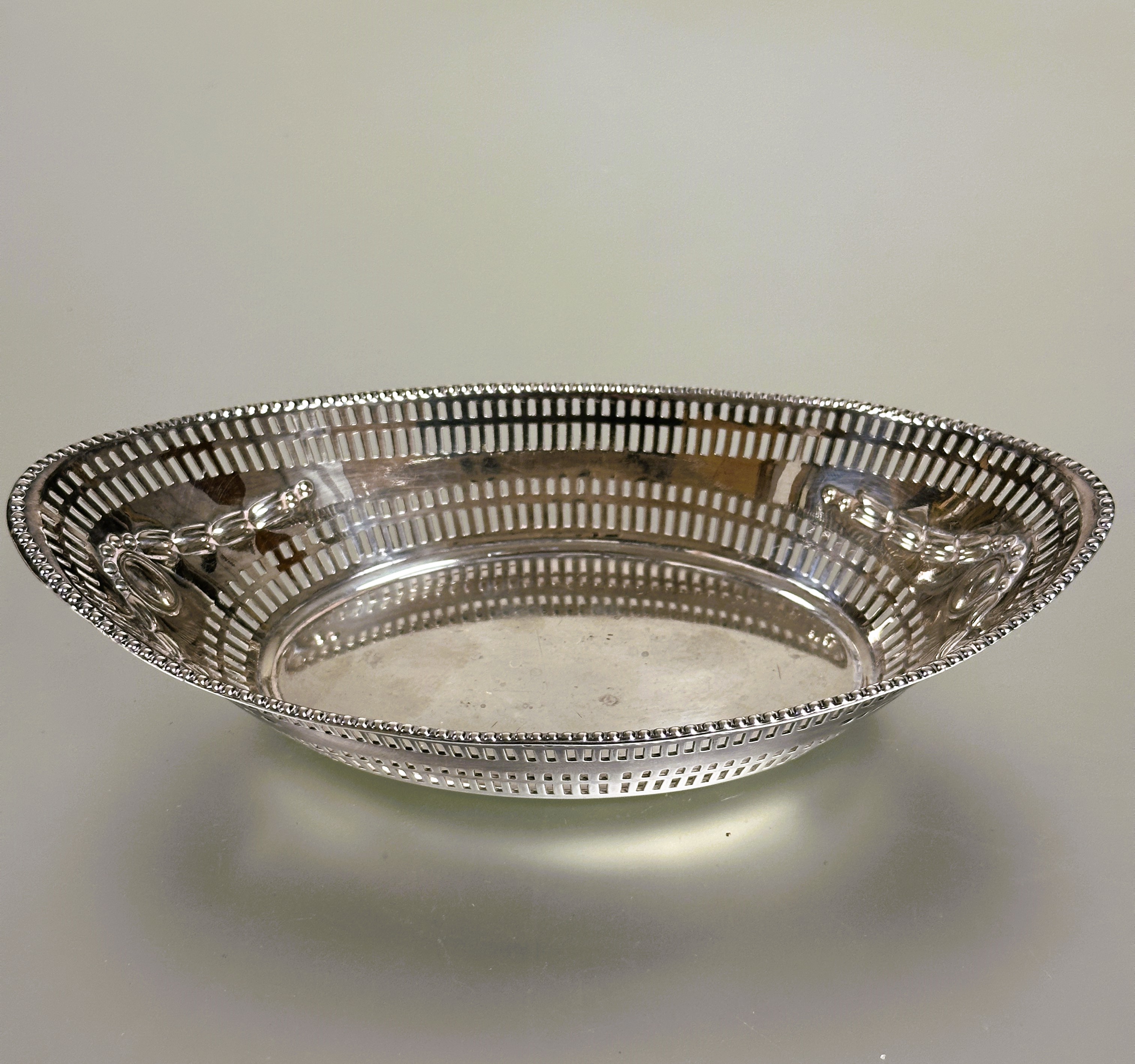 A late Victorian Sheffield silver navette shaped nut dish with beaded pierced border and chased - Image 2 of 3