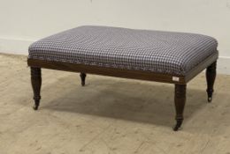 A large Victorian style walnut footstool / coffee table, the upholstered top raised on turned