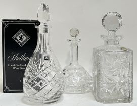 A boxed Shetland Hand Cut Lead Crystal Wine Decanter (h- 31cm, with paper label), together with an