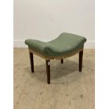 An early 20th century stool, the dished top upholstered in green damask, raised on square tapered