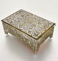 A  Austro-Hungarian brass cigarette box the top with cast double headed eagle raised on bracket feet