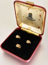 A set of three 9ct gold dress studs with engine turned engraved decoration D x 0.6cm in original
