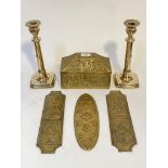 A group of antique brassware, to include a pair of 19th century brass candlesticks (H26cm) a pair of