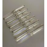 A Set of six Sheffield silver handled fruit knives and five forks L x 17cm (11)