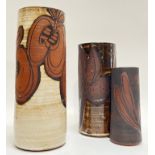 Three studio pottery earthenware cylindrical vases with paper/wax-resist decoration (two marked