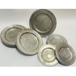 A group of twelve pewter plates (w- 24cm), marked Brasil verso, together with another twelve