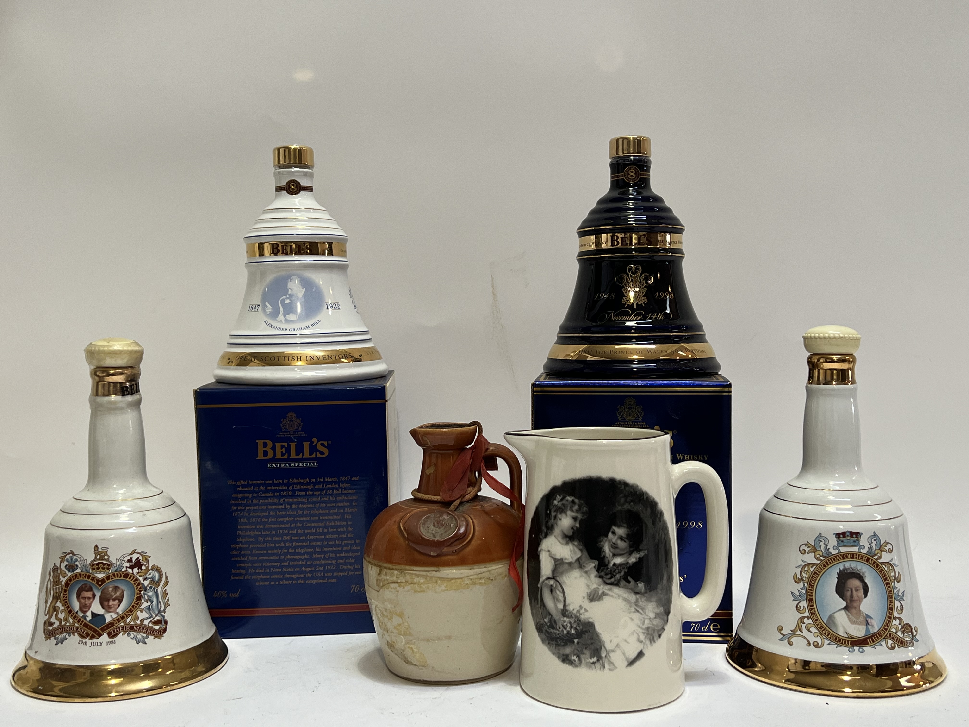 Four bottles of Bell's commemorative whisky comprising a 1981 Charles and Diana 75cl bottle, a - Image 2 of 2
