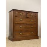 An Edwardian walnut chest, fitted with two short and three long drawers, raised on a plinth base.