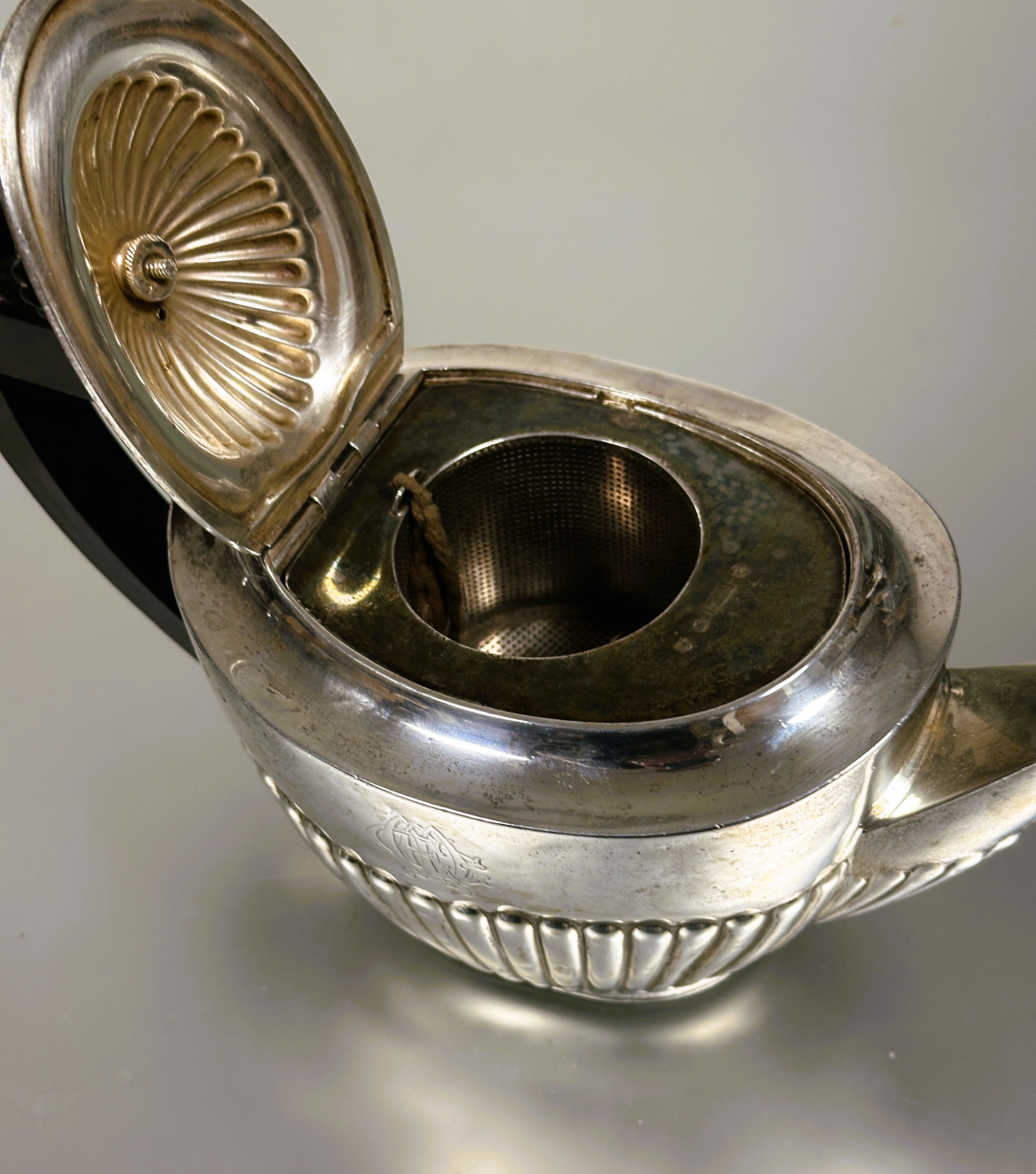 A late Victorian Edinburgh  silver oval half lobbed tea pot by  Mackay & Chisholm with stained - Image 2 of 5