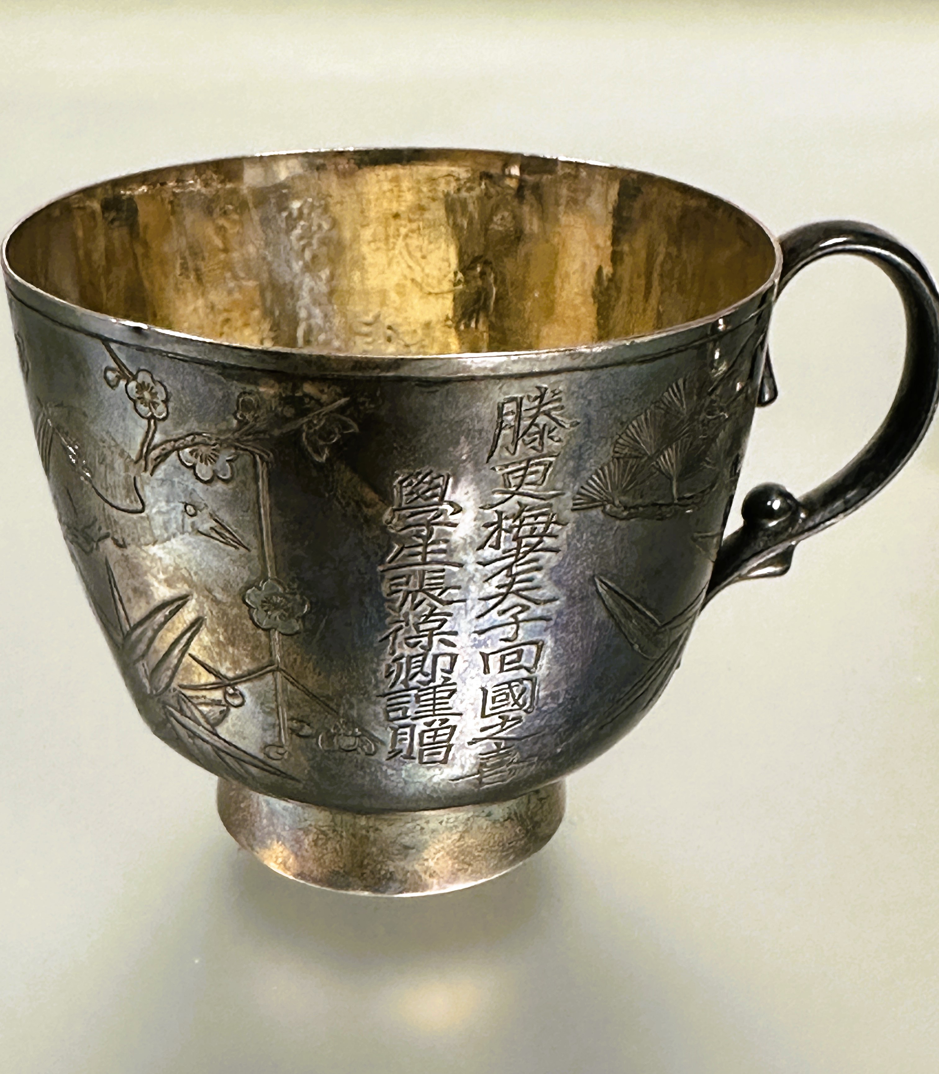 A 20thc Chinese white metal cup, cover and spoon standing on a water Lilly stand the cover engraved - Image 8 of 8