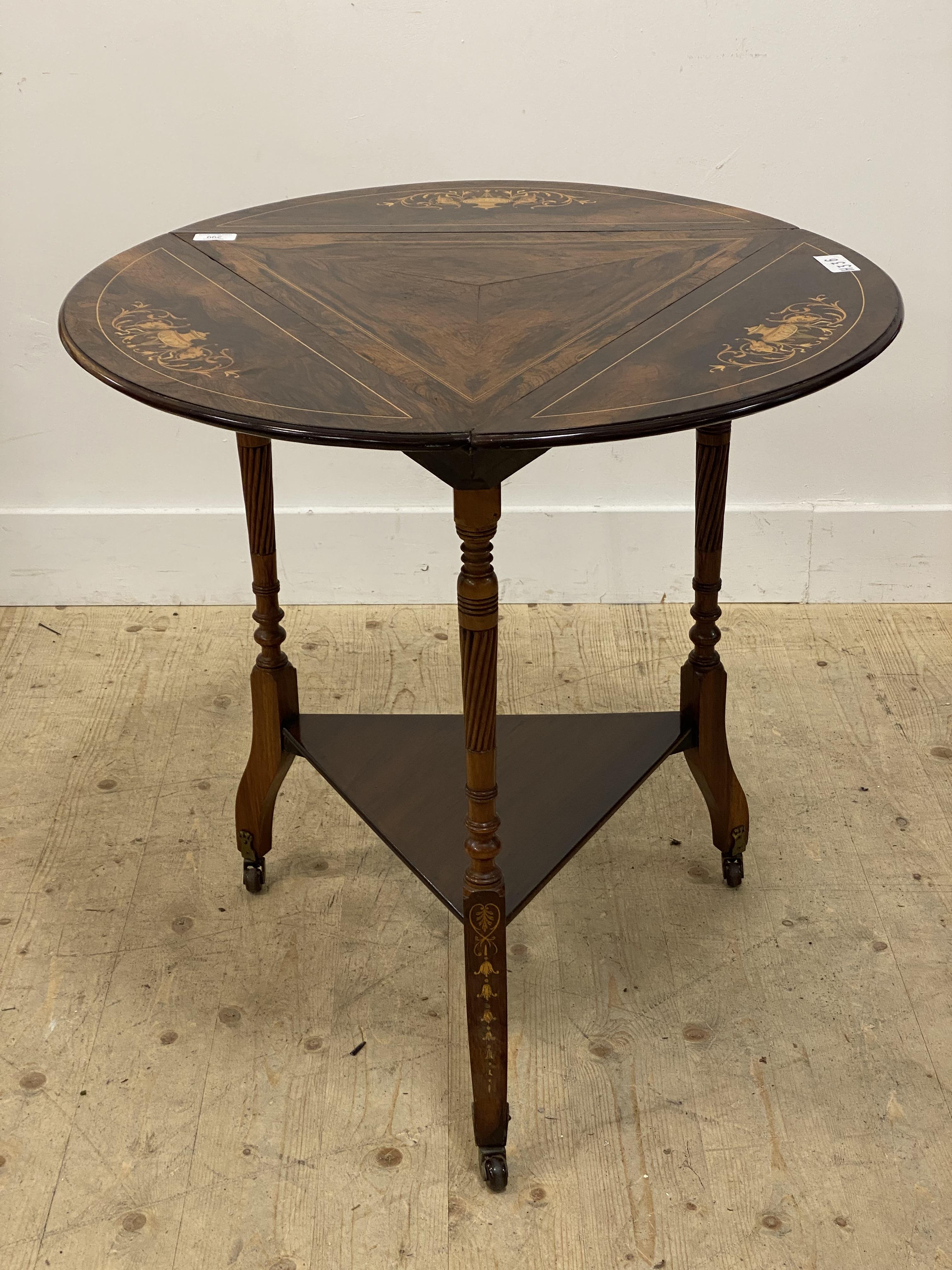 A late Victorian rosewood occasional table, the triangular / circular top with three demi-lune