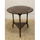 A late Victorian rosewood occasional table, the triangular / circular top with three demi-lune