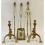 A pair of late Victorian cast brass and-irons (H35cm) together with a late Victorian brass three