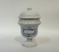 A Pharmacy/Apothecary tin-glazed earthenware display jar and cover with blue cartouche to centre. (