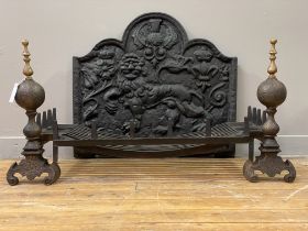 A cast-iron fire back, decorated with thistle, rose and fleur de lys motifs, further cast with