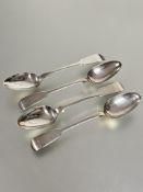 A set of four George IV Edinburgh silver fiddle pattern tea spoons  Edinburgh 1829 show signs of